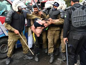 Pakistani police fired tear gas into Imran Khan’s home