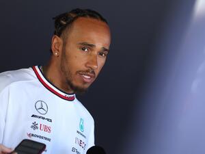 Mercedes' British driver Lewis Hamilton arrives speaks to media ahead of the 2023 Formula One Australian Grand Prix at the Albert Park Circuit in Melbourne on March 30, 2023. (Photo by Martin KEEP / AFP)