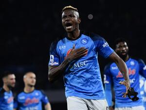Napoli's Nigerian forward Victor Osimhen celebrates after Napoli opened the scoring during the Italian Serie A football match between Napoli and Atalanta on March 11, 2023 at the Diego-Maradona stadium in Naples. (Photo by Filippo MONTEFORTE / AFP)