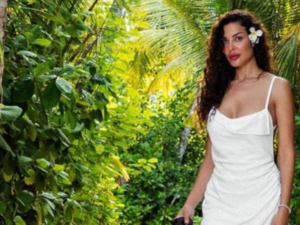 Nadine Njeim dances with a Pizza Dough