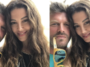Kıvanç Tatlıtuğ gives his wife a kiss in rare snap