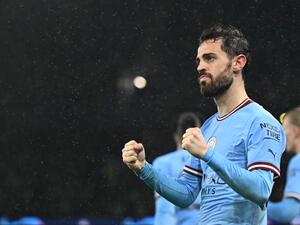 Manchester City's Portuguese midfielder Bernardo Silva celebrates after scoring their second goal during the UEFA Champions League quarter final, first leg football match between Manchester City and Bayern Munich at the Etihad Stadium in Manchester, north-west England, on April 11, 2023. (Photo by Oli SCARFF / AFP)