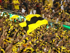 Ittihad supporters cheer during the Saudi Pro League football match between al-Ittihad and al-Hilal at the King Abdullah Sports City in Jeddah on May 23, 2022. (Photo by AFP)