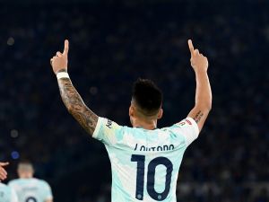 Inter Milan's Argentinian forward Lautaro Martinez celebrates scoring his team's second goal during the Italian Cup (Coppa Italia) final football match between Fiorentina and Inter Milan at the Stadio Olimpico in Rome, on May 24, 2023. (Photo by Isabella BONOTTO / AFP)