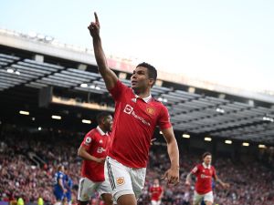 Manchester United's Brazilian midfielder Casemiro celebrates after scoring their opening goal during the English Premier League football match between Manchester United and Chelsea at Old Trafford in Manchester, north west England, on May 25, 2023. (Photo by Oli SCARFF / AFP)