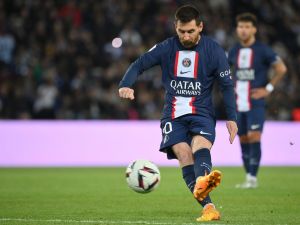 Paris Saint-Germain's Argentine forward Lionel Messi kicks a free kick during the French L1 football match between Paris Saint-Germain (PSG) and Ajaccio at the Parc des Princes in Paris, on May 13, 2023. (Photo by FRANCK FIFE / AFP)