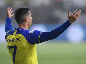 Nassr's Portuguese forward Cristiano Ronaldo reacts during the Saudi Pro League football match between Al-Nassr and Al-Raed at the al-Awwal Park Stadium in the Saudi capital Riyadh on April 28, 2023. (Photo by AFP)