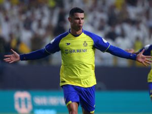 Nassr's Portuguese forward Cristiano Ronaldo reacts after scoring during the Saudi Pro League football match between Al-Nassr and Al-Shabab at the al-Awwal Park Stadium in Riyadh on May 23, 2023. (Photo by Fayez NURELDINE / AFP)