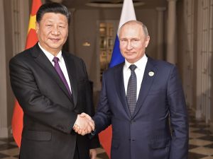 الرئيس الصيني شي جين بينغ ونظيره الروسي فلاديمير بوتين