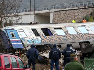 German train runs over employees, kills 2