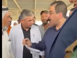 مشادة بين وزير التجارة ومواطن عراقي