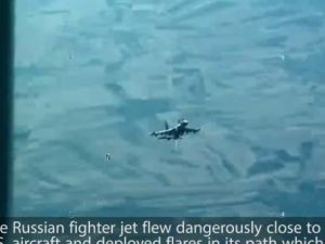 طائرة روسية تقترب من مسيرة اميركية