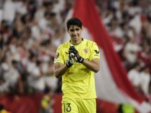 Sevilla's Moroccan goalkeeper Yassine Bounou "Bono" celebrates at the end of the UEFA Europa league quarter final second Leg football match between Sevilla and Manchester United at the Ramon Sanchez-Pizjuan stadium in Seville on April 20, 2023. (Photo by CRISTINA QUICLER / AFP)