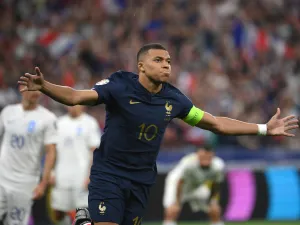 France's forward Kylian Mbappe reacts after scoring the team's first goal during the UEFA Euro 2024 group B qualification football match between France and Greece at the Stade de France in Saint-Denis, in the northern outskirts of Paris, on June 19, 2023. (Photo by FRANCK FIFE / AFP)