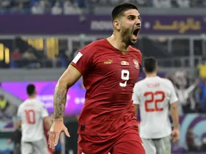 Serbia's forward #09 Aleksandar Mitrovic celebrates scoring his team's first goal during the Qatar 2022 World Cup Group G football match between Serbia and Switzerland at Stadium 974 in Doha on December 2, 2022. (Photo by JAVIER SORIANO / AFP)