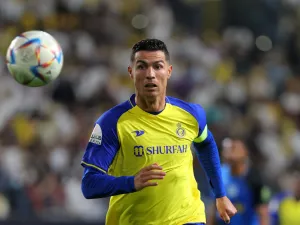 Nassr's Portuguese forward Cristiano Ronaldo looks on as he runs after ball during the King Cup quarter-final football match between al-Nassr and Abha at Mrsool Park Stadium in Riyadh on March 14, 2023. (Photo by Fayez NURELDINE / AFP)