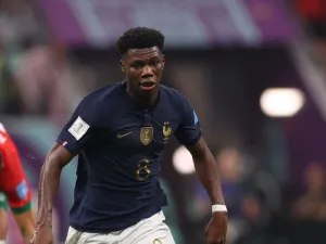 France's midfielder #08 Aurelien Tchouameni runs with the ball during the Qatar 2022 World Cup semi-final football match between France and Morocco at the Al-Bayt Stadium in Al Khor, north of Doha on December 14, 2022. (Photo by ADRIAN DENNIS / AFP)