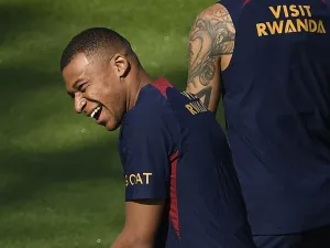 Paris Saint-Germain's French forward Kylian Mbappe reacts as he takes part in a training session at the new "campus" of French L1 Paris Saint-Germain (PSG) football club at Poissy, some 30kms west of Paris on July 20, 2023, ahead of the club's Japan tour. (Photo by JULIEN DE ROSA / AFP)