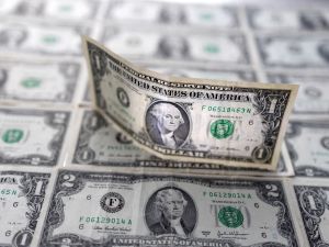 Dollar Hits New Highs Against Some Currencies Following Federal Reserve's Stance