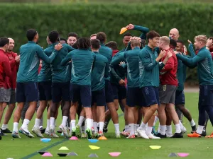Arsenal's Japanese defender #18 Takehiro Tomiyasu (6R) and teammates attend a team training session at Arsenal's training ground in north London on September 19, 2023, ahead of their UEFA Champions League Group B football match against PSV Eindhoven. (Photo by Adrian DENNIS / AFP)