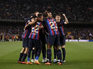 Barcelona's players celebrate their team first goal during the Spanish league football match between FC Barcelona and Real Betis at the Camp Nou stadium in Barcelona on April 29, 2023. (Photo by Josep LAGO / AFP)