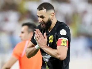 Ittihad's French forward #09 Karim Benzema gestures during the Saudi Pro League football match between Al-Ittihad and Al-Akhdoud at Prince Hathloul bin Abdulaziz Stadium in Najran on September 14, 2023. (Photo by AFP)