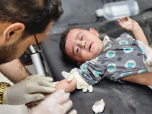 Injured child in the latest Israeli attack on Gaza. (Photo shared exclusively for AlBawaba byHani Alshaer)