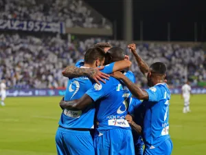 Hilal's Senegalese defender #03 Kalidou Koulibaly celebrates with his teammates after scoring the first goal during the Saudi Pro League football match between Al-Hilal and Al-Shabab at Prince Faisal Bin Fahd Stadium in Riyadh on September 29, 2023. (Photo by Fayez Nureldine / AFP)