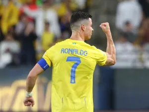 Nassr's Portuguese forward #07 Cristiano Ronaldo celebrates after scoring their second goal during the Saudi Pro League football match between Al-Nassr and Damac at the King Saud University Stadium in Riyadh on October 21, 2023. (Photo by Fayez NURELDINE / AFP)