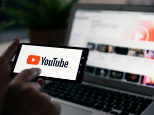 smart phone with YouTube logo