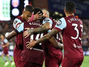 West Ham United's Ghanaian midfielder #14 Mohammed Kudus celebrates with teammates after scoring a goal during the UEFA Europa League group A football match between West Ham United and Backa Topola at The London Stadium in east London on September 21, 2023. (Photo by HENRY NICHOLLS / AFP)