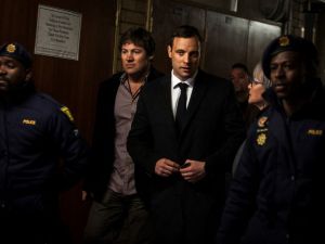South African Paralympian Oscar Pistorius arrives at the Pretoria High Court for sentencing procedures in his murder trial. (John Wessels/ AFP)