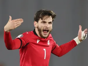 Georgia's midfielder #07 Khvicha Kvaratskhelia celebrates after scoring the team's first goal during the UEFA Euro 2024 football tournament Group A qualifying match between Georgia and Scotland in Tbilisi on November 16, 2023. (Photo by Giorgi ARJEVANIDZE / AFP)