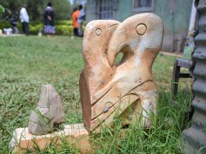 A stone sculpture is seen outside the home of Kenyan sculptor Elkana Ong'esa in Tabaka. (Photo by SIMON MAINA / AFP) African art