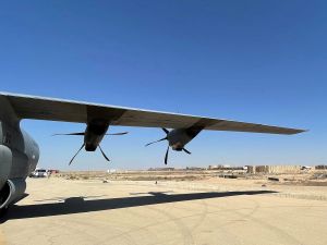 This picture taken on July 8, 2021 shows a view of the wing of a C-130 Hercules turboprop military transport aircraft on the runway at Ain al-Assad air base, which hosts US forces in Iraq in the western Anbar province, a day after fourteen rockets were fired at the base.
