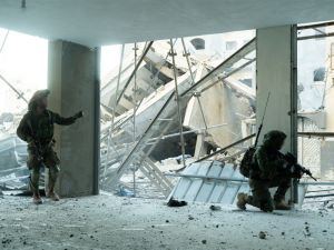 This handout picture released by the Israeli army on December 23, 2023 shows soldiers operating in the Gaza Strip amid continuing battles between Israel and the Palestinian  resistance, Hamas.