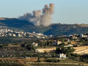 Smoke billows during Israeli bombardment on the outskirts of the border town of Marwahin in southern Lebanon, on December 26, 2023
