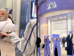 Protesters enter Zara carrying shrouds