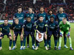 Arsenal's team players pose for a photograph ahead of a UEFA Champions League group B football match between PSV Eindhoven and Arsenal FC at the Philips Stadium in Eindhoven, on December 12, 2023. (Photo by KENZO TRIBOUILLARD / AFP)