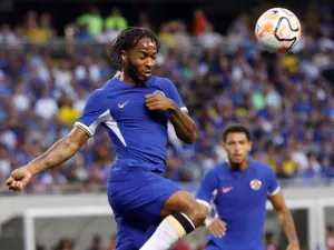 Chelsea's English midfielder Raheem Sterling jumps for the ball during a pre-season friendly football match between Chelsea FC and Borussia Dortmund BVB at Soldier Field in Chicago, Illinois, on August 2, 2023. (Photo by KAMIL KRZACZYNSKI / AFP)