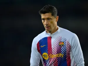 Barcelona's Polish forward #09 Robert Lewandowski looks on before the start of the Spanish league football match between FC Barcelona and Girona FC at the Estadi Olimpic Lluis Companys in Barcelona on December 10, 2023. (Photo by Pau BARRENA / AFP)