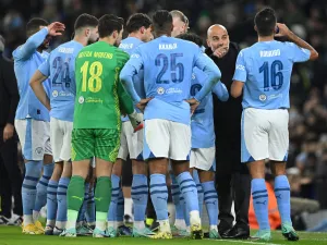 Manchester City's Spanish manager Pep Guardiola gives instructions to his players during the UEFA Champions League Group G football match between Manchester City and RG Leipzig at the Etihad Stadium, in Manchester, north west England, on November 28, 2023. (Photo by Oli SCARFF / AFP)