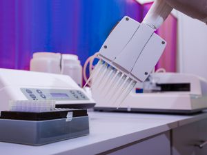 Robotic dispensing machine in modern biochemical laboratory