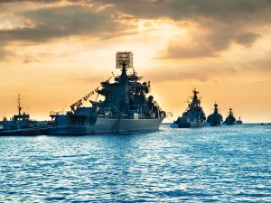 Military navy ships in a sea 