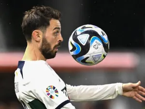 Portugal’s midfielder #10 Bernardo Silva chest controls the ball during the UEFA Euro 2024 Group J qualification football match between Liechtenstein and Portugal at the Rheinpark stadium in Vaduz, Liechtenstein, on November 16, 2023. (Photo by SEBASTIEN BOZON / AFP)