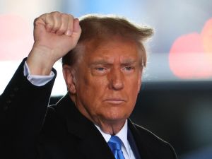 Donald Trump edges out Joe Biden with RFK Jr. as spoiler in 2024 race, according to poll. (Charly TRIBALLEAU/ AFP)