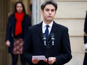 Newly appointed Prime minister Gabriel Attal delivers a speech during the handover ceremony with outgoing Prime minister Elisabeth Borne at the Hotel Matignon in Paris, on January 9, 2024.