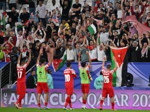 الأردن تواجه كوريا الجنوبية يوم السبت (Photo by HECTOR RETAMAL / AFP)