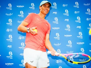 Spain's Rafael Nadal hits balls to fans during a promotional event ahead of the Brisbane International tennis tournament in Brisbane on December 29, 2023. (Photo by Patrick HAMILTON / AFP)