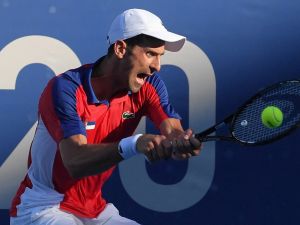 نوفاك ديوكوفيتش (Photo by Tiziana FABI / AFP)